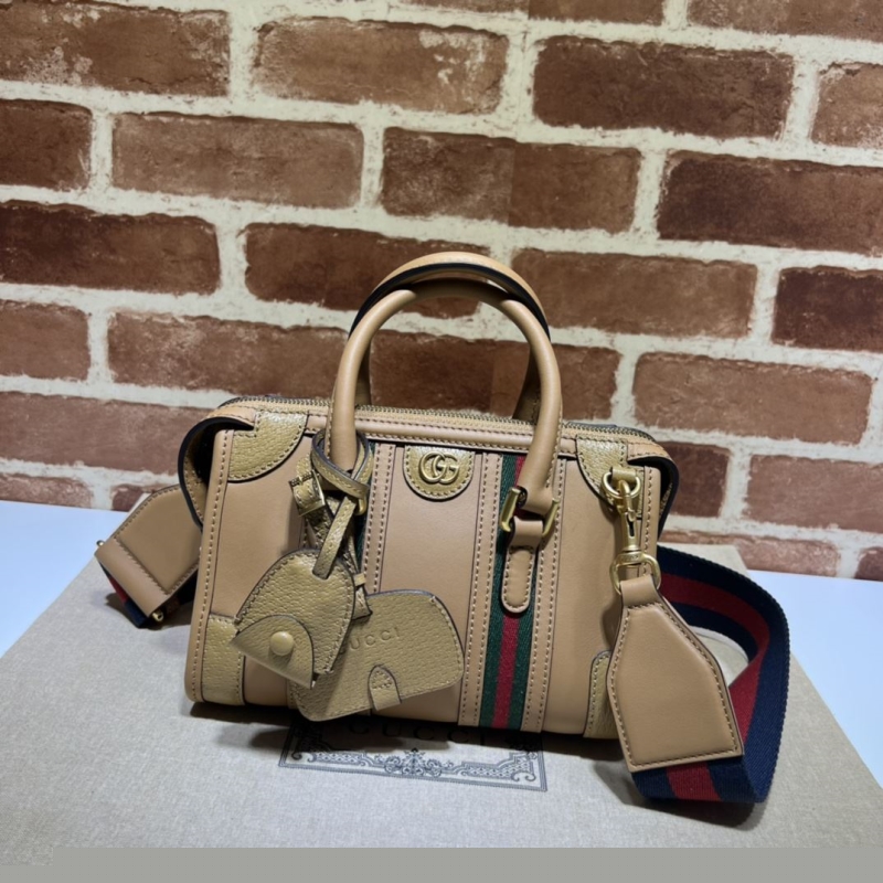 G*u*i top handle bags
